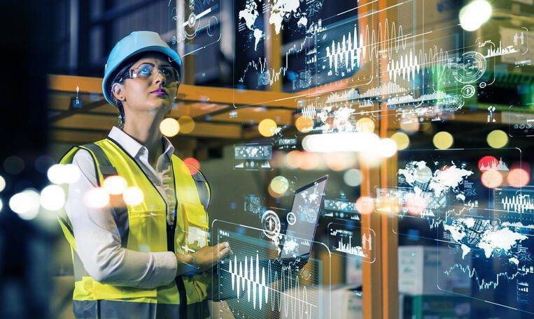 Woman in hard hat looking up