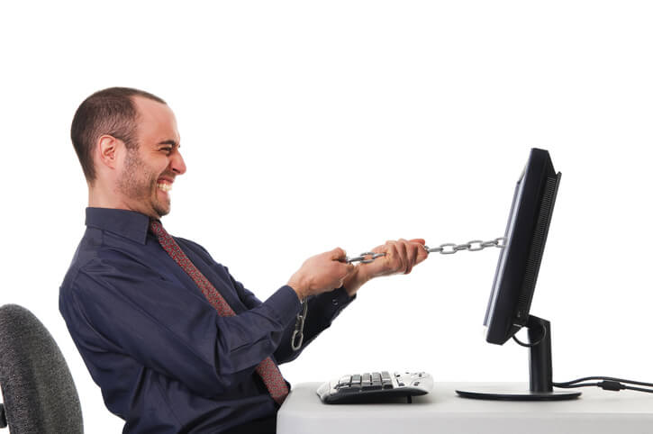Man pulling a chain out of his computer screen